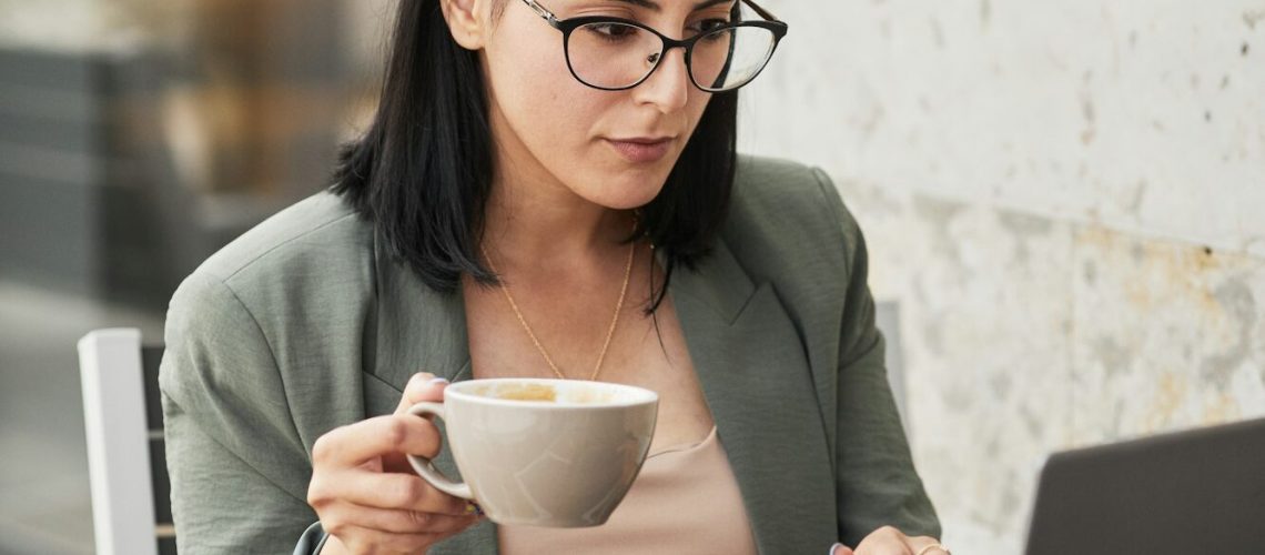 Businesswoman in Outdoor Cafe