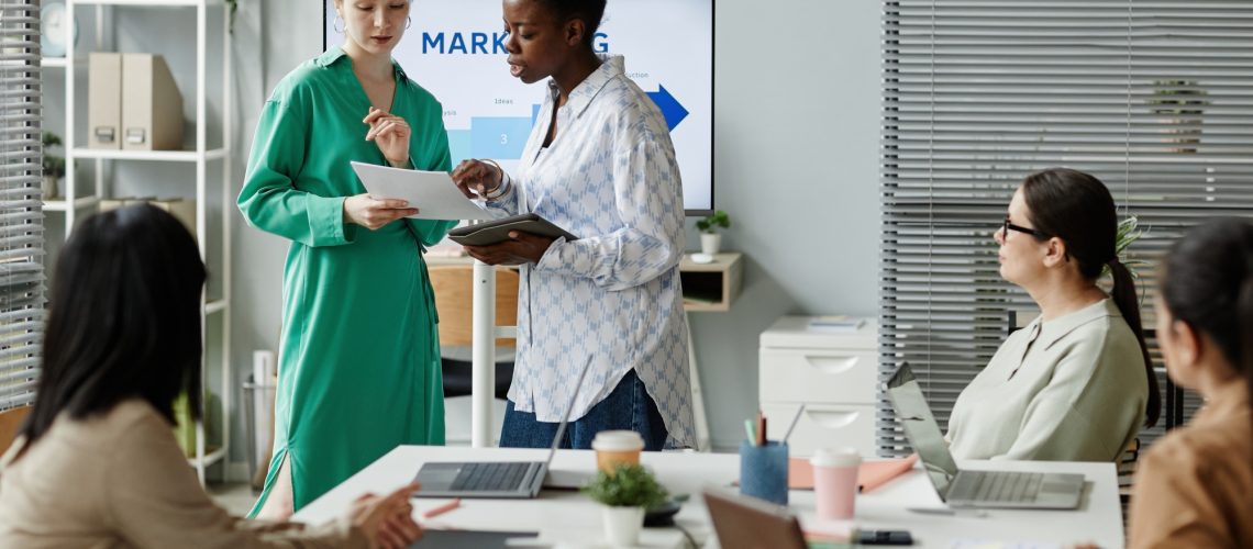 Partners analyzing situation at business presentation