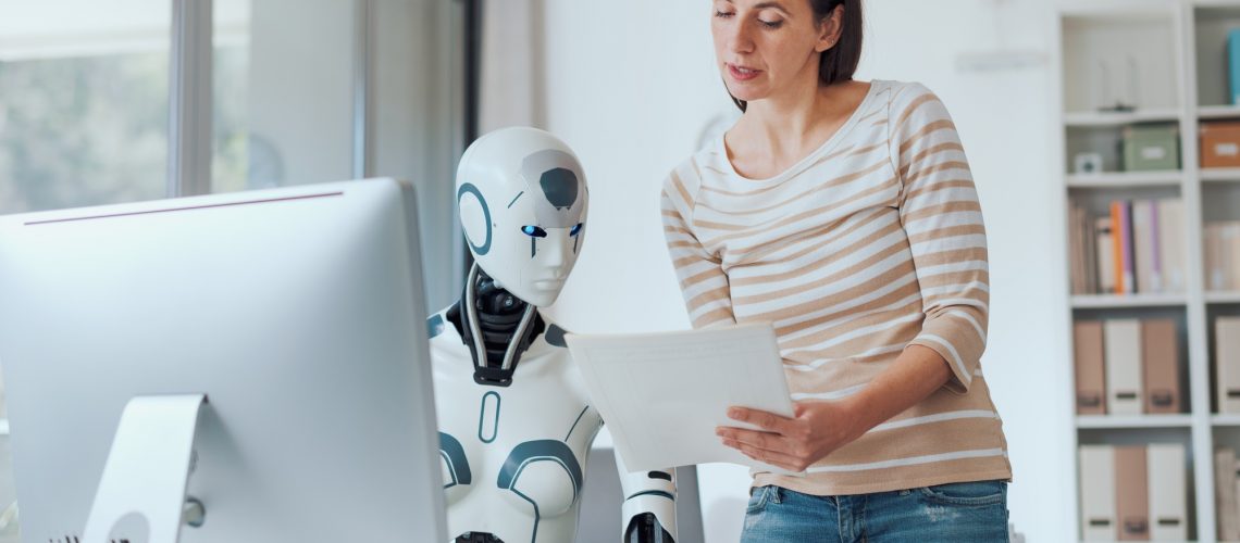Woman and AI robot working together