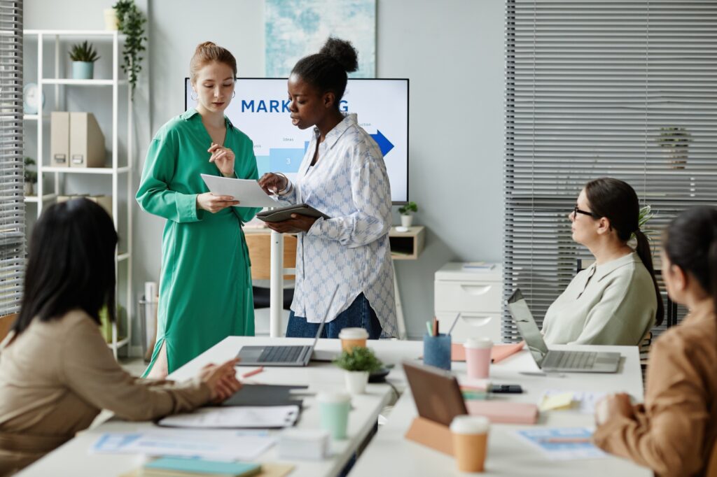 Partners analyzing situation at business presentation